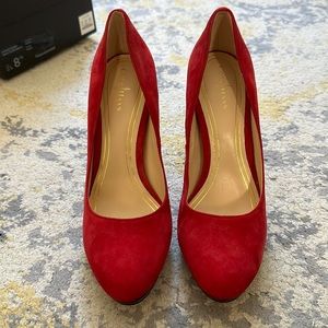 Cole Haan with Nike Air soles. Magenta colored.